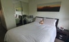 Small bedroom with built-in wardrobe