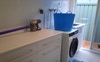 Laundry with toilet 