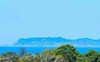 Views from the balcony to Byron headland