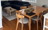 Dining room with big comfy lounge and dining table