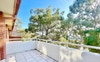 Balcony with trees and native birds
