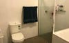 Bathroom with shower, bathtub, ample storage