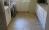 Kitchen complete with coffee maker, utensils etc