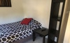 Room can fit double bed, bedside table and bookshe