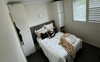 Bedroom with built in wardrobes