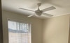 Bedroom also has a window, fan and power point