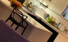 Kitchen area with microwave and  blender.