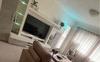 Living room with broadband internet and aircon.