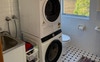 Washer/Dryer Combo + Bathroom area