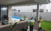 Backyard patio and pool area.