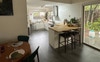 Dining area with table and bar stools