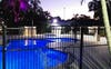 Heated swimming pool in the evening