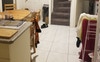 Kitchen walkthrough to stairs