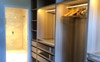 Walk in robe looking into ensuite 