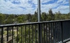 Peaceful NE facing balcony view over the treetops 