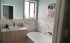 Bathroom with freestanding bath