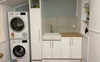 Laundry with washing machine and clothes dryer