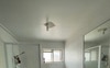 Shared bathroom with shower and toilet 