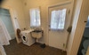 Shared bathroom laundry & separate toilet