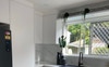 Kitchen has plenty of cupboard space 