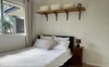 Queen bed (gas strut lift and under bed storage)
