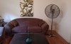 Lounge Room 2 couches and Open Fire Place