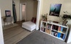 Living room area and what used to be a dining room