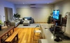 Open plan kitchen, dining and lounge area.