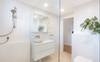 Heated floor, open shower with rain showerhead