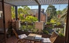 Balcony overlooks the end of the street