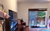 Living room, from front door, looking at backyard