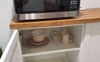 Brand new microwave + bowls plates etc
