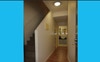 Downstairs bathroom adjacent to two bedrooms.