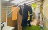 Clothes line under cover and clothers drier