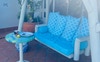 Swing chair on balcony  to watch magic sunsets